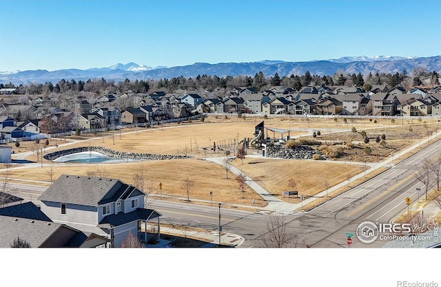 drone / aerial view featuring a mountain view