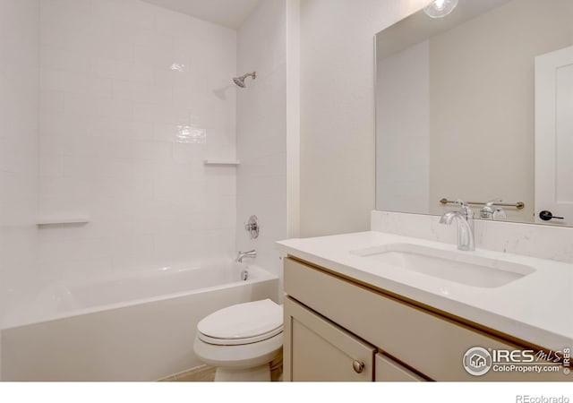 full bathroom featuring shower / washtub combination, toilet, and vanity