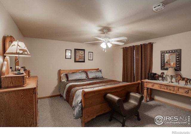 bedroom with ceiling fan and carpet flooring