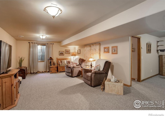 living room featuring light carpet