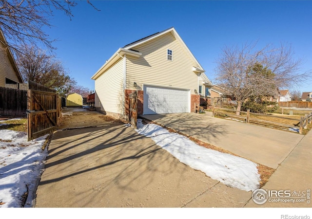 view of home's exterior with a garage