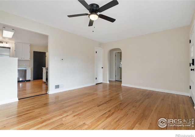 unfurnished room featuring ceiling fan and light hardwood / wood-style floors