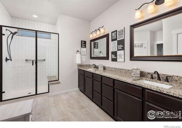 bathroom featuring vanity and walk in shower