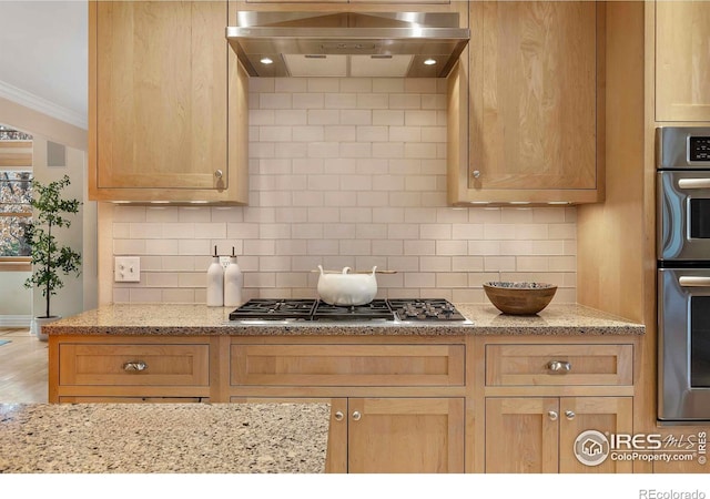 6345 Swallow Ln, Boulder, CO 80303 - kitchen featuring ventilation hood, stainless steel appliances, decorative backsplash, crown molding, and light stone countertops