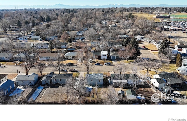 drone / aerial view featuring a mountain view