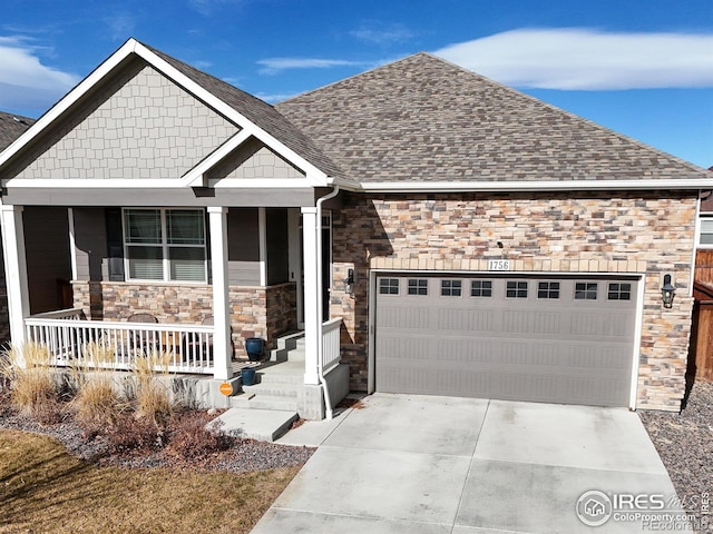 craftsman-style house featuring a garage and covered porch