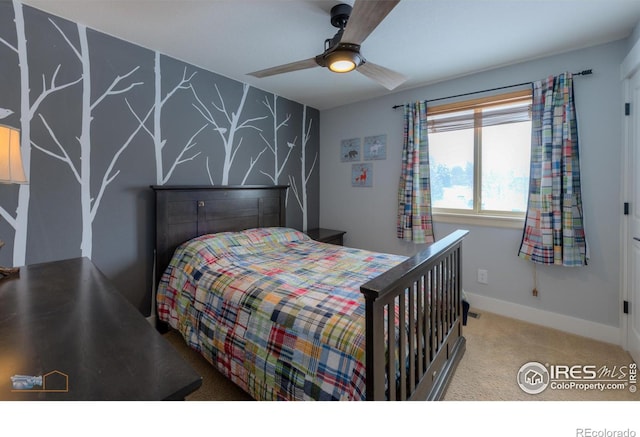 carpeted bedroom featuring ceiling fan