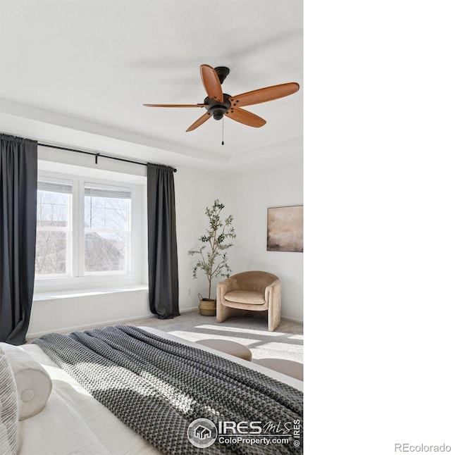 bedroom with ceiling fan and carpet flooring