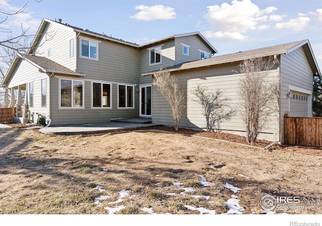 back of house with a patio area