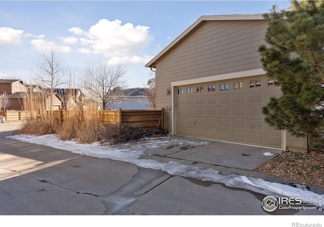 view of property exterior featuring a garage