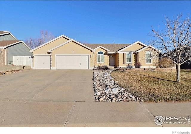 single story home featuring a garage