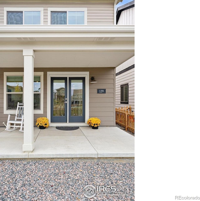 entrance to property featuring french doors