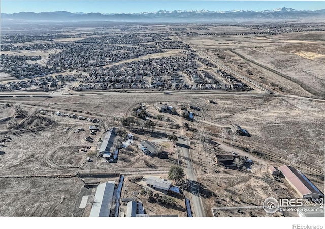 drone / aerial view featuring a mountain view