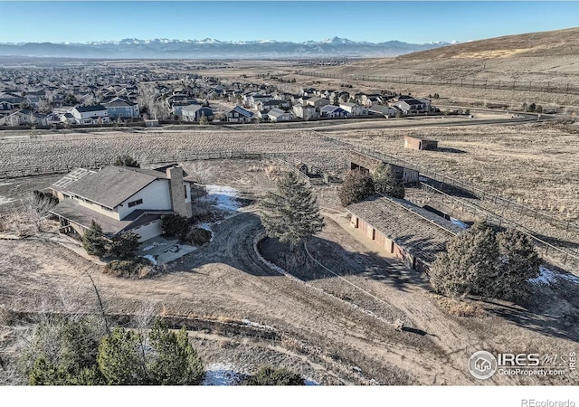 bird's eye view with a mountain view