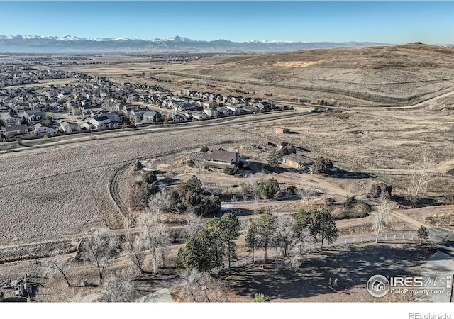 bird's eye view with a mountain view