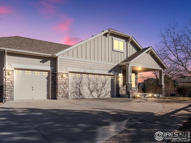 craftsman-style home with a garage