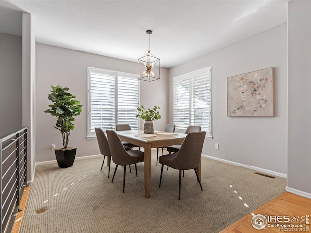 dining room with a chandelier