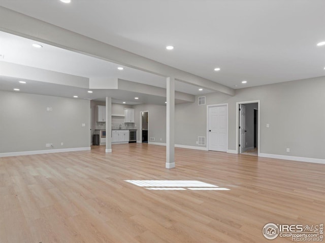 basement with light wood-type flooring