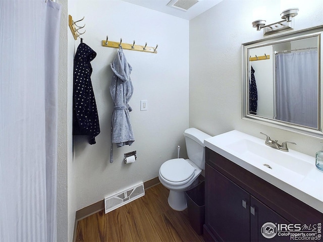 4667 Ashfield Dr, Boulder, CO 80301 - full bathroom featuring vanity and wood finished floors