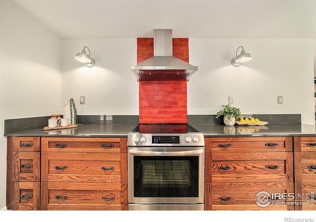 kitchen featuring island range hood and stainless steel range with electric cooktop