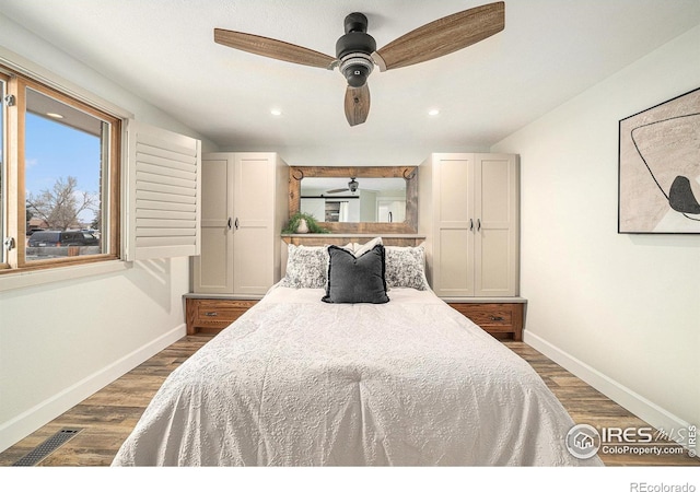 bedroom featuring ceiling fan and dark wood-type flooring