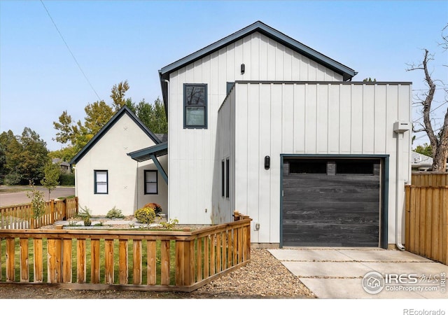 modern farmhouse style home with a garage