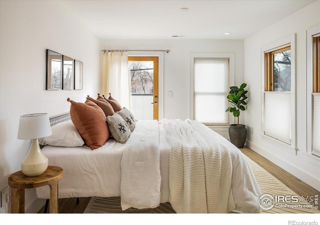 bedroom featuring hardwood / wood-style floors