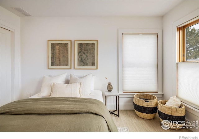 bedroom featuring hardwood / wood-style flooring