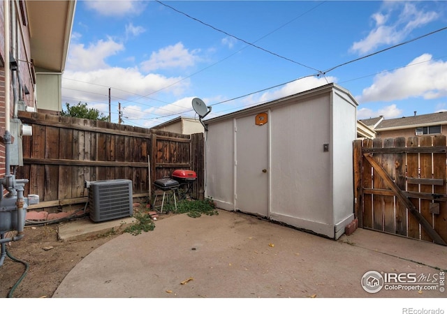 view of outbuilding featuring central air condition unit