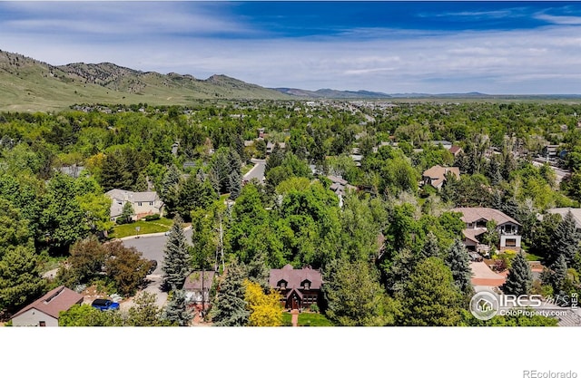 drone / aerial view featuring a mountain view