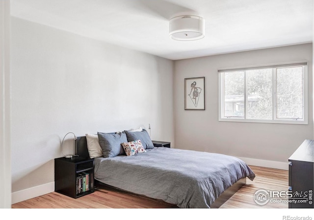 bedroom featuring light hardwood / wood-style flooring