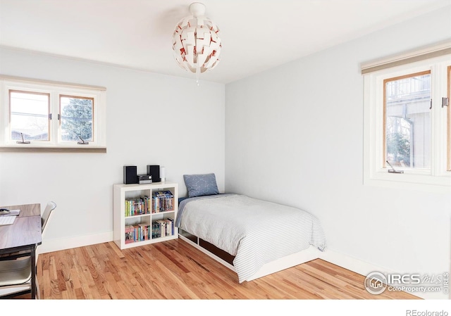 bedroom featuring hardwood / wood-style flooring