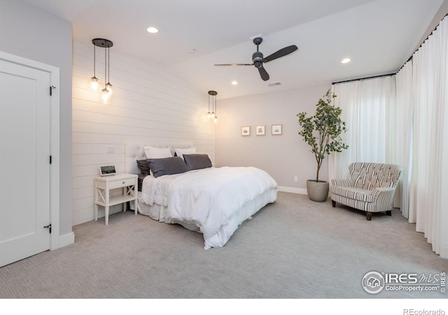 carpeted bedroom with ceiling fan