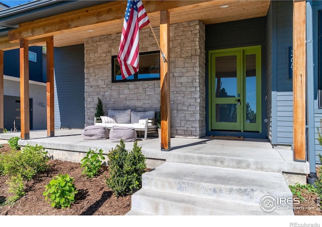 property entrance with covered porch