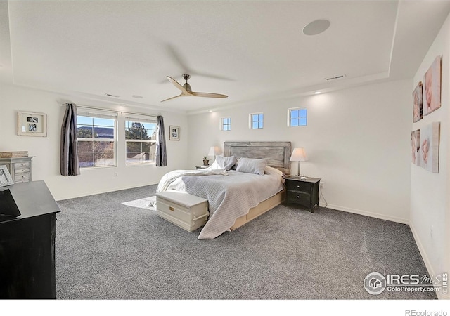 carpeted bedroom with ceiling fan