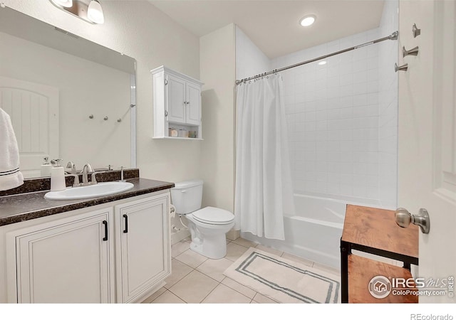 full bathroom with shower / bath combo, toilet, tile patterned flooring, and vanity