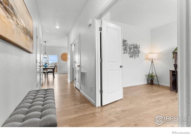 hall featuring light wood-type flooring