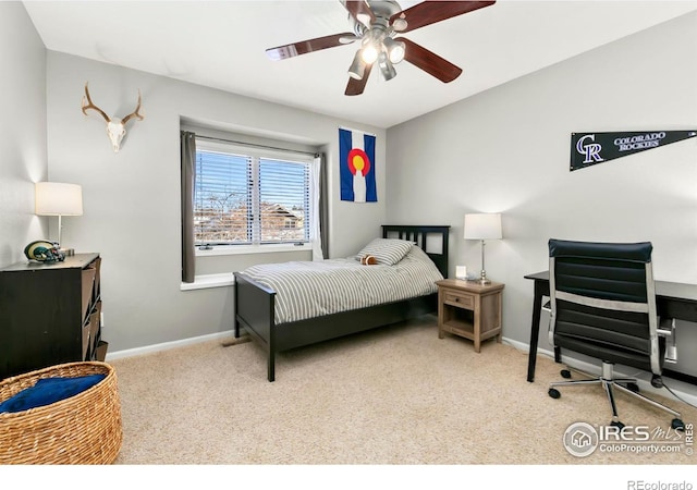 bedroom with light colored carpet and ceiling fan