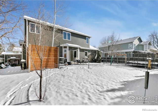 view of snow covered property