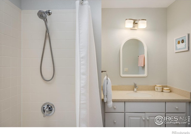 bathroom with vanity and a shower with curtain