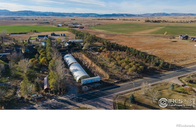 12155 N County Road 15, Wellington, CO 80549 - birds eye view of property featuring a rural view and a mountain view