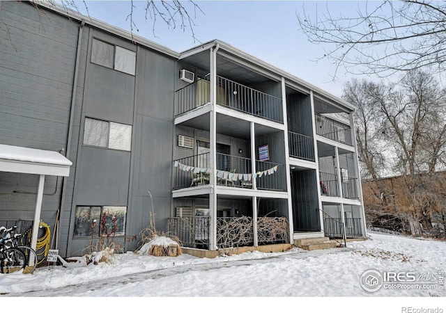 view of snow covered property