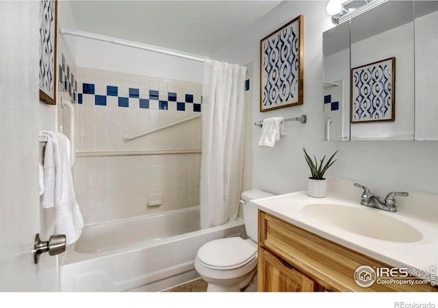 full bathroom with vanity, shower / bath combination with curtain, and toilet