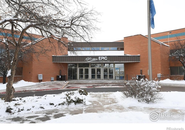 view of snow covered building