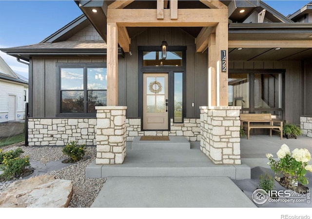 entrance to property with covered porch