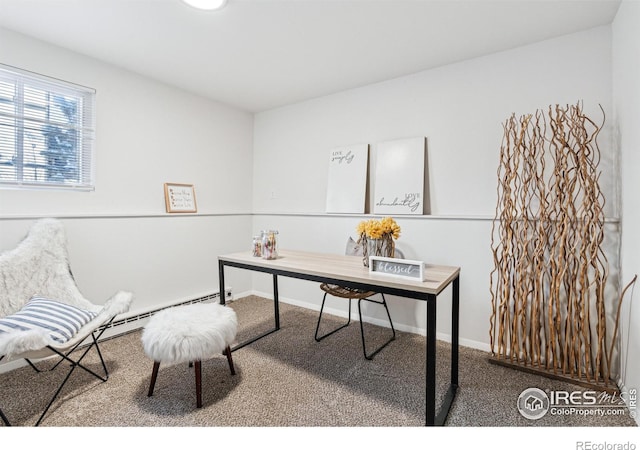 office area featuring carpet, baseboards, and baseboard heating