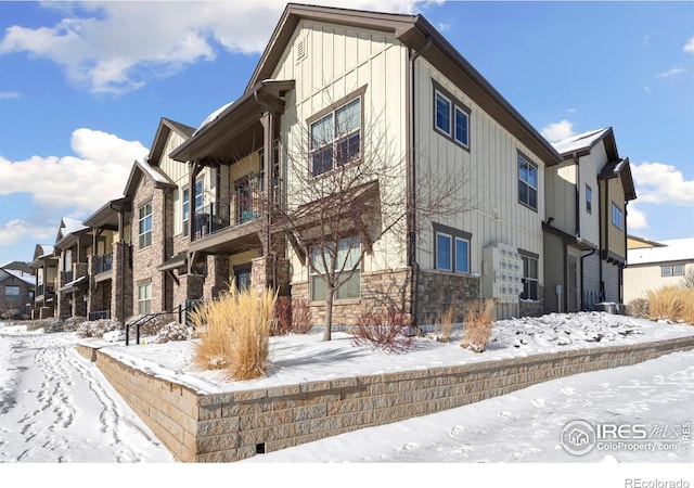 view of snow covered building