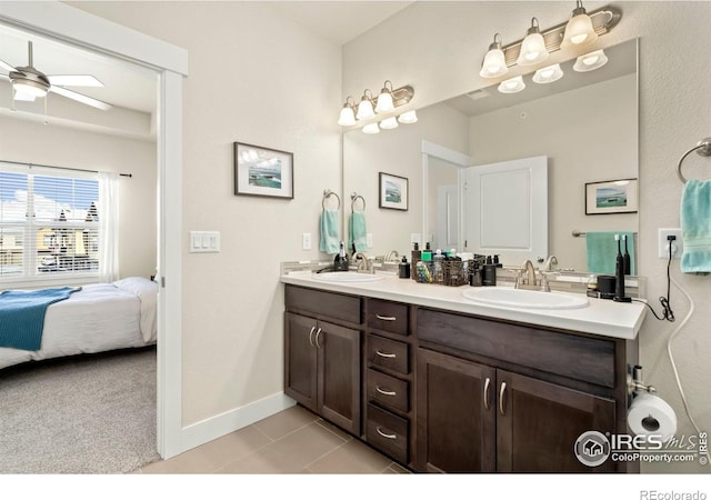 bathroom featuring vanity, ceiling fan, and tile patterned floors