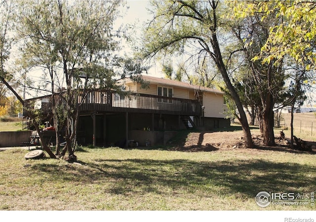 view of yard with a deck