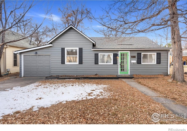 ranch-style home with a garage